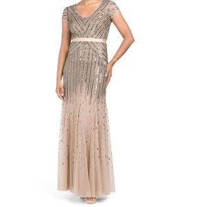 Formal evening gown. Size 4. Ombré color/bead pattern. Only worn once.